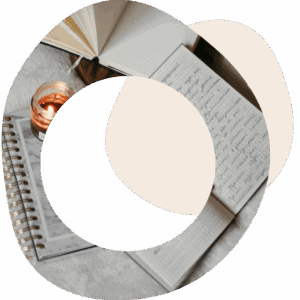 Abstract image of journals, books and a pen