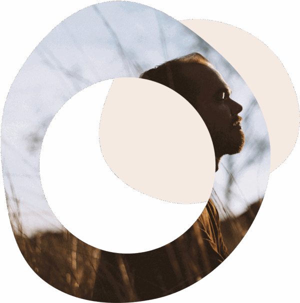 abstract circles image of a male standing in nature and looking into the distance